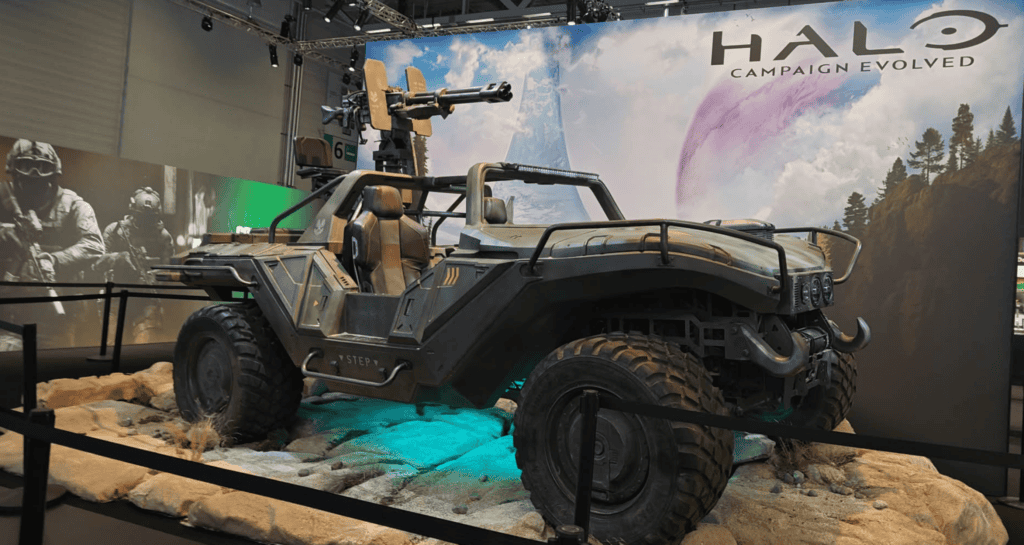 Military-style off-road vehicle with mounted weapon at Gamescom 2026.