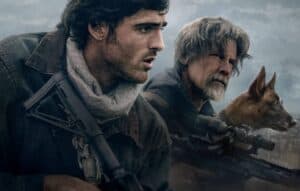 Two men and a dog with rifles in a post-apocalyptic setting.